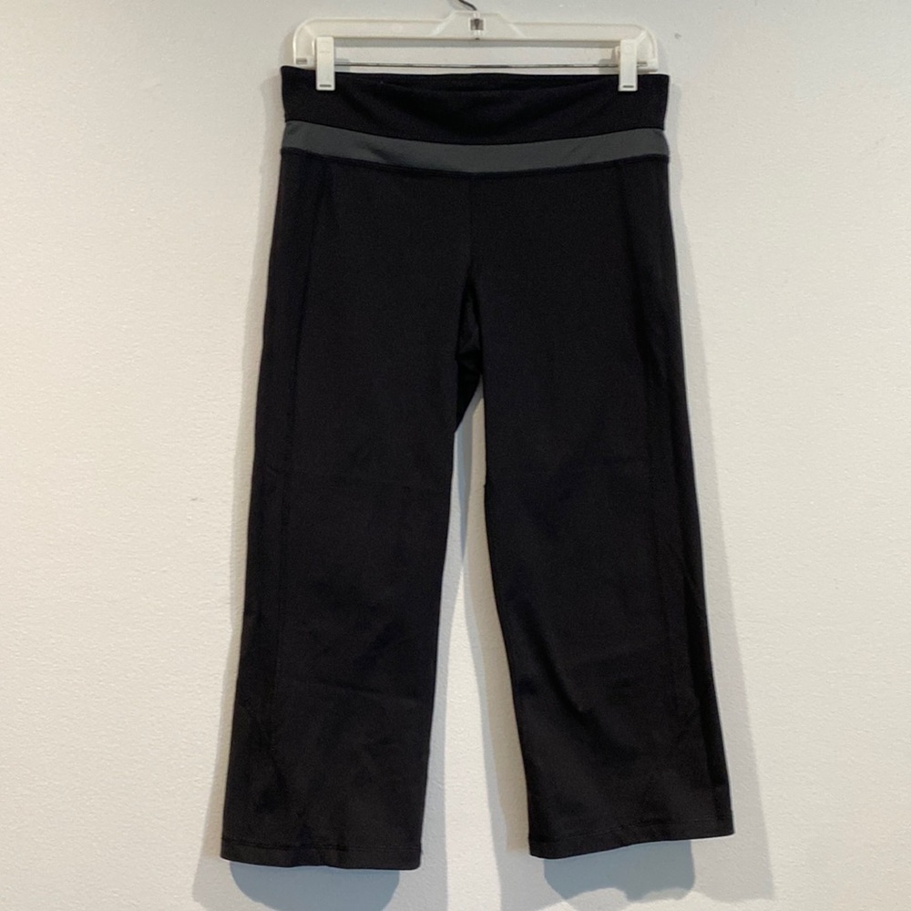 Black Cropped Athletic Pants with Gray Stripe along Waist - Size Medium?